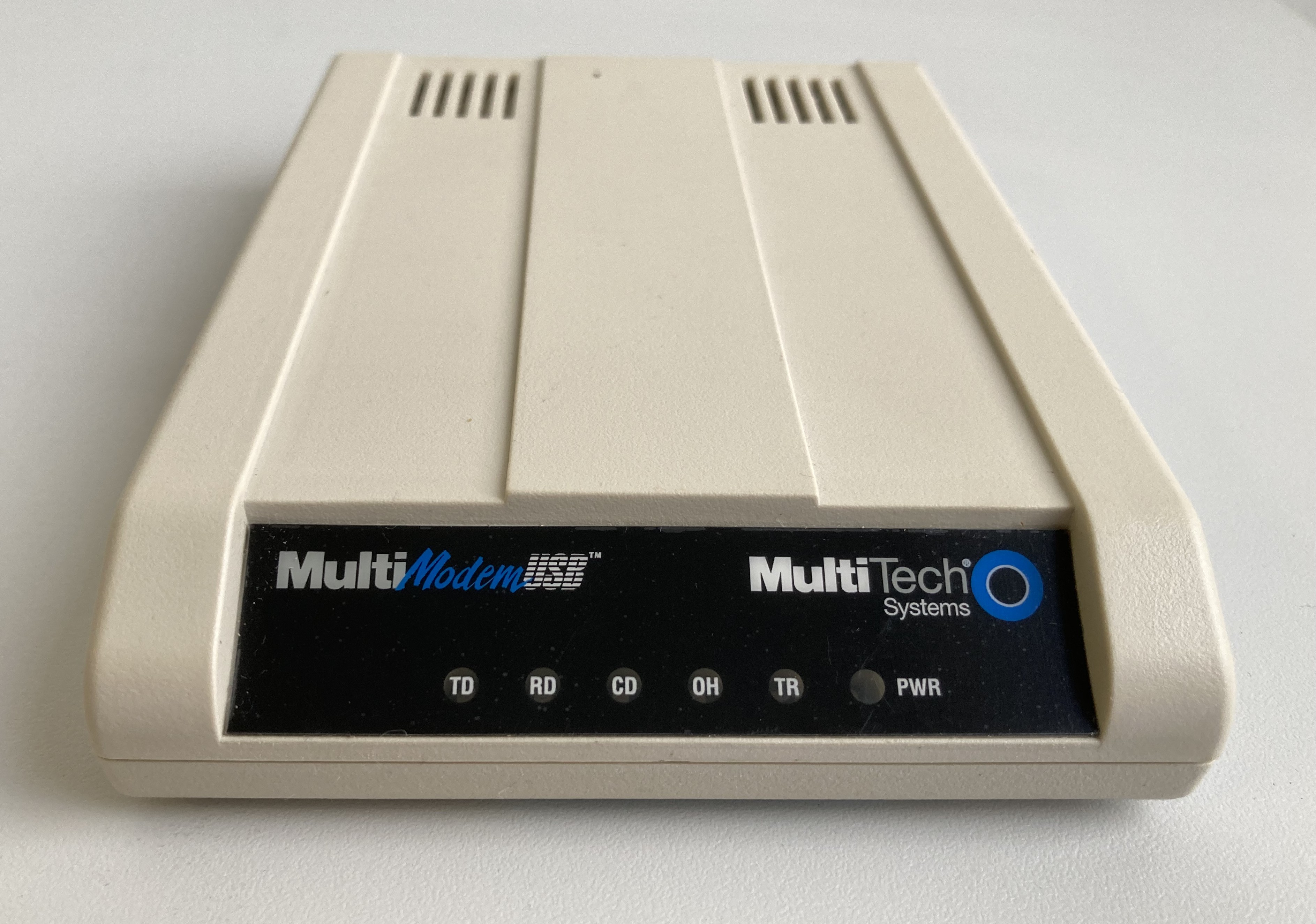 MultiTech_MT5634ZBA-USB-V92-case-front-perspective.jpg